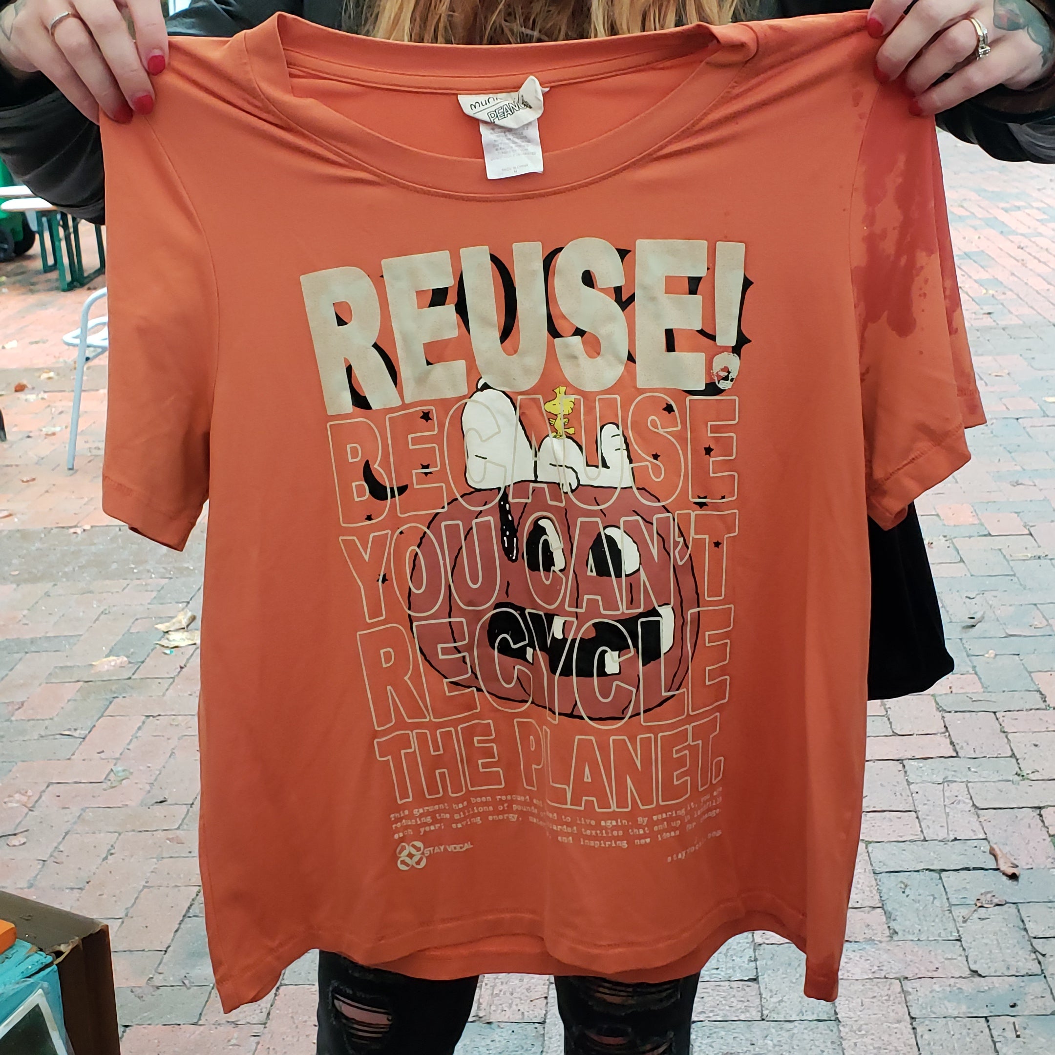 Eco friendly upcycled orange Snoopy on a Pumpkin T-Shirt that says Reuse Because You Can't Recycle The Planet.