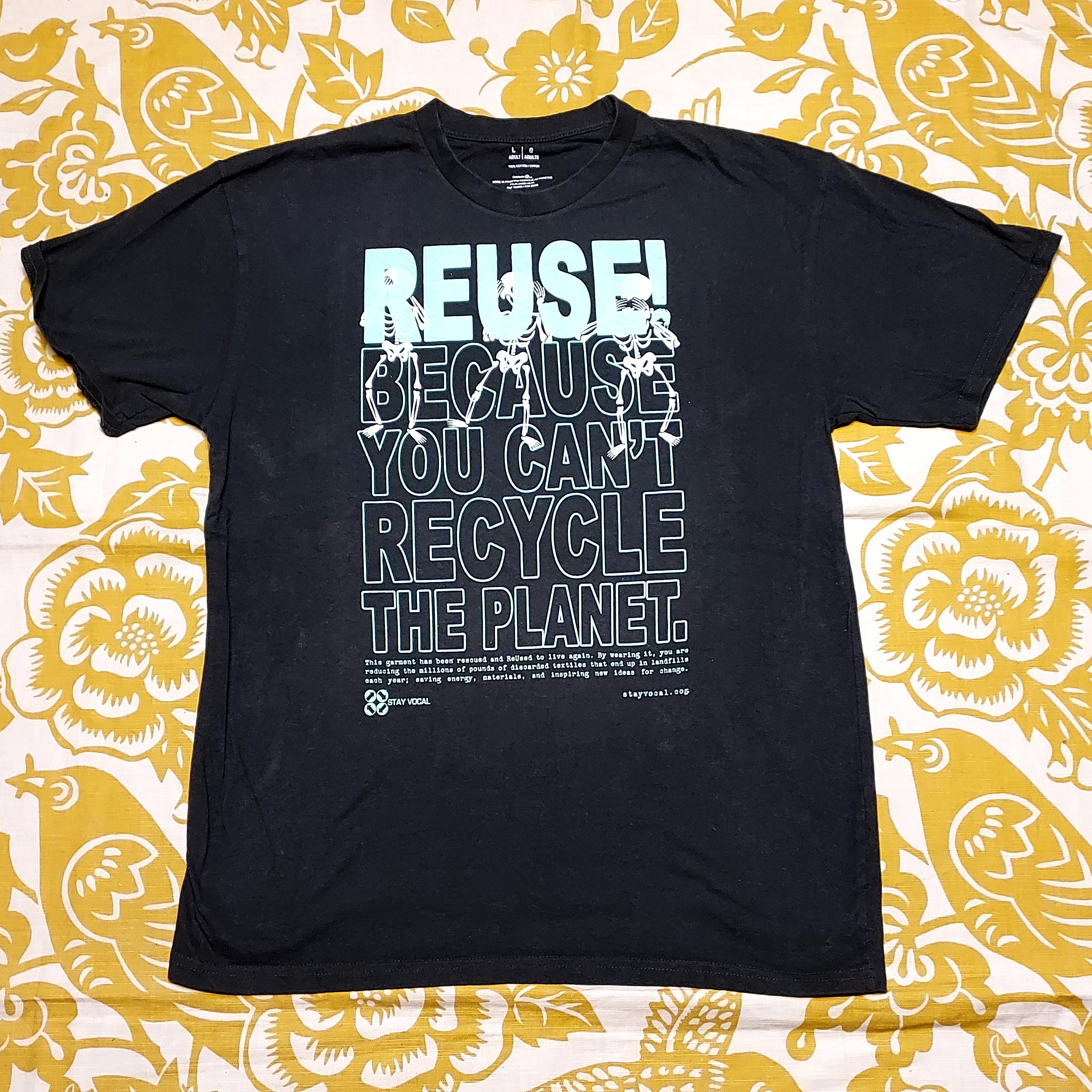 Eco friendly upcycled black dancing skeletons T-Shirt that says Reuse Because You Can't Recycle The Planet.