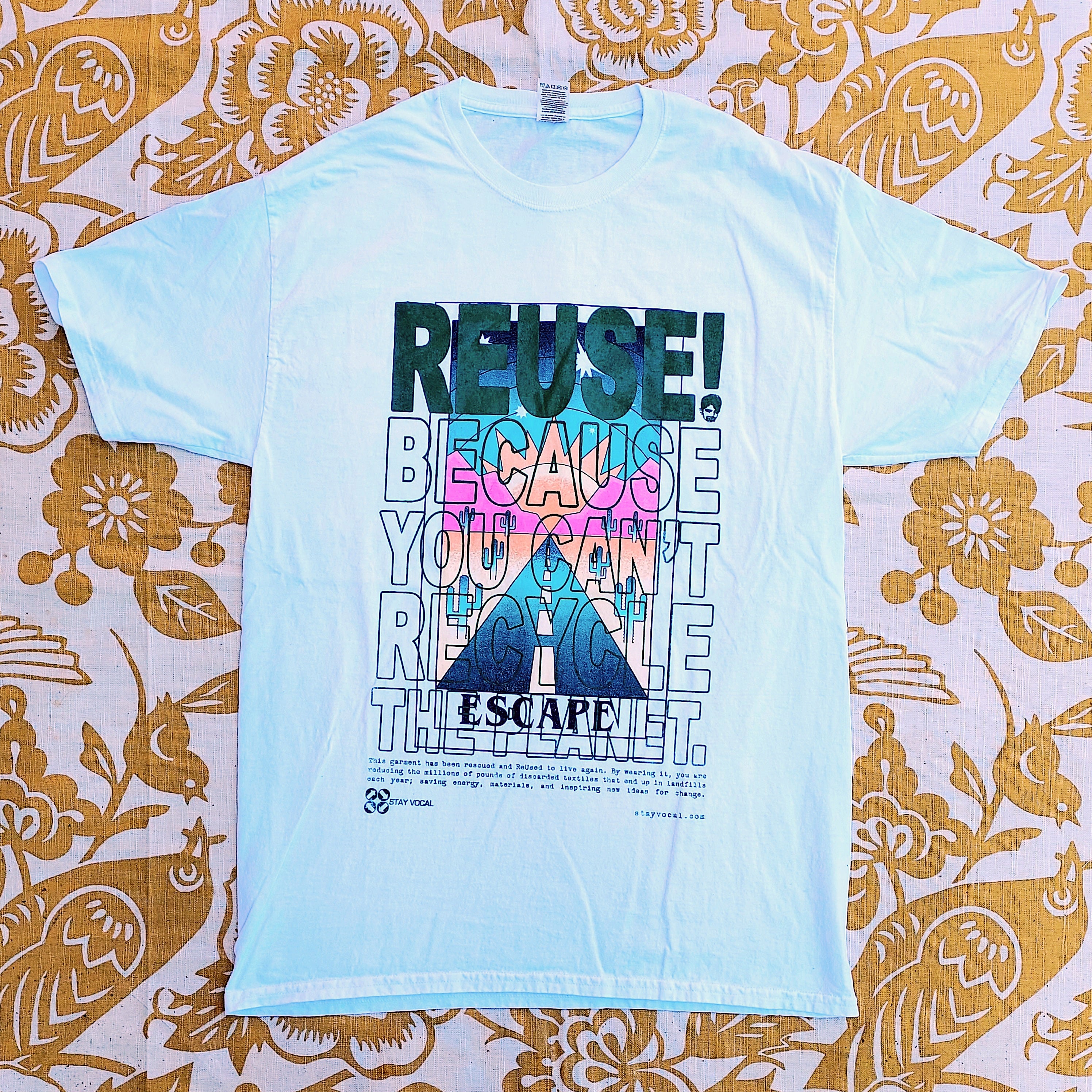 Eco friendly upcycled white Escape road T-Shirt that says Reuse Because You Can't Recycle The Planet.