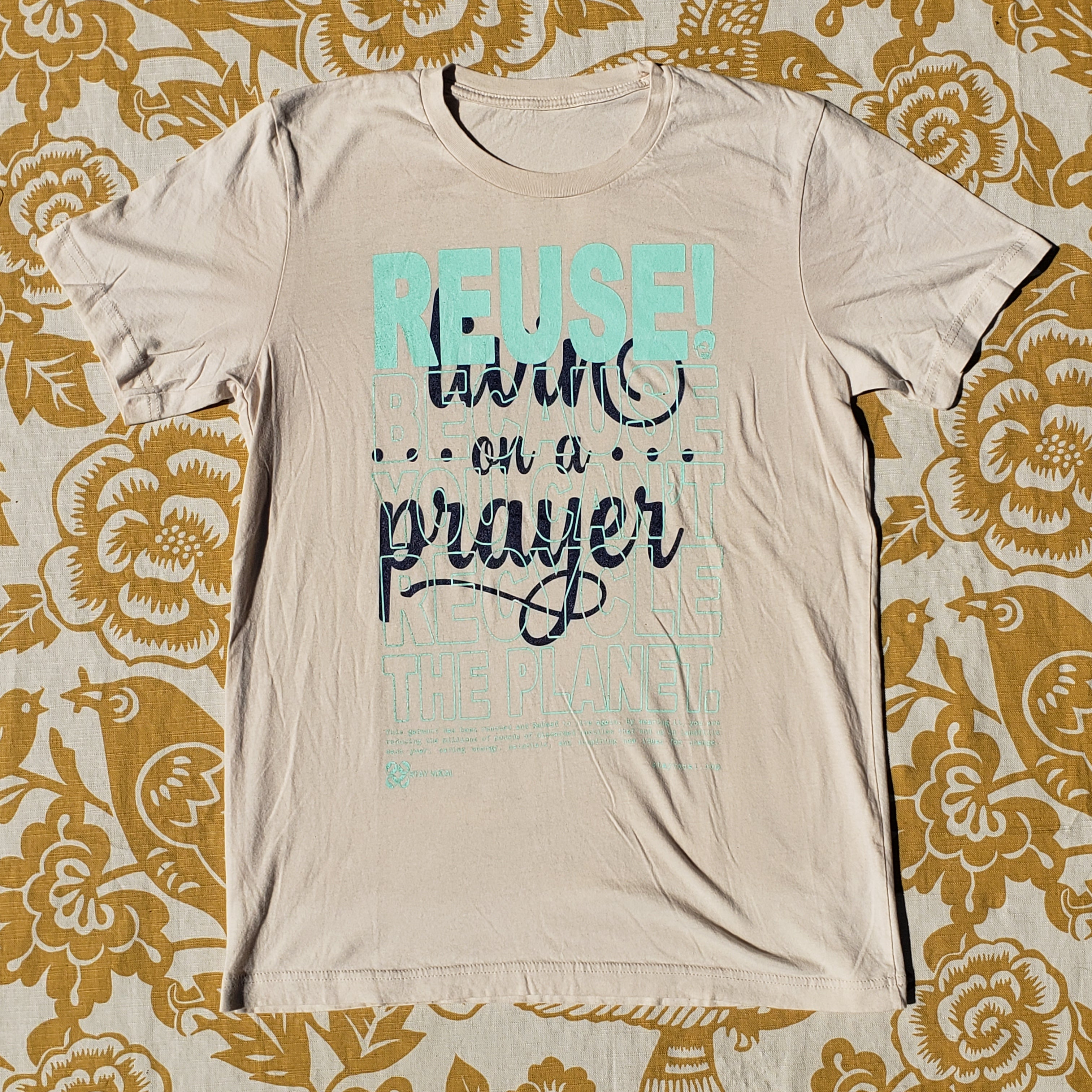 Eco friendly upcycled tan Livin on a Prayer T-Shirt that says Reuse Because You Can't Recycle The Planet.