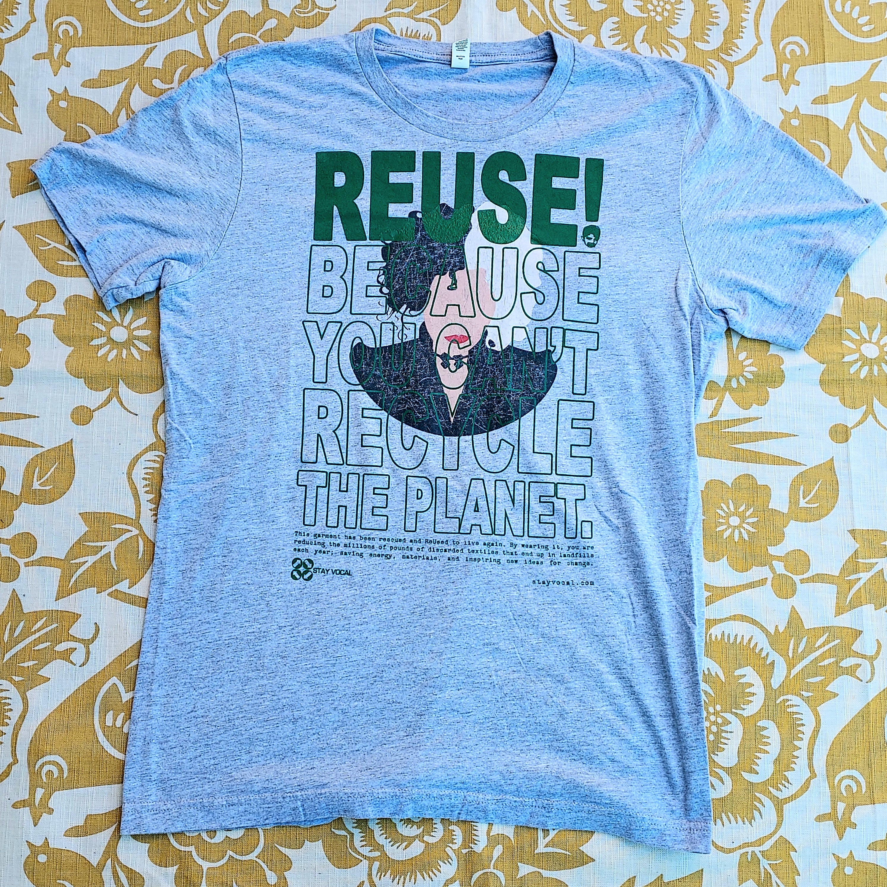 Eco friendly upcycled gray Cruella de Vil T-Shirt that says Reuse Because You Can't Recycle The Planet.