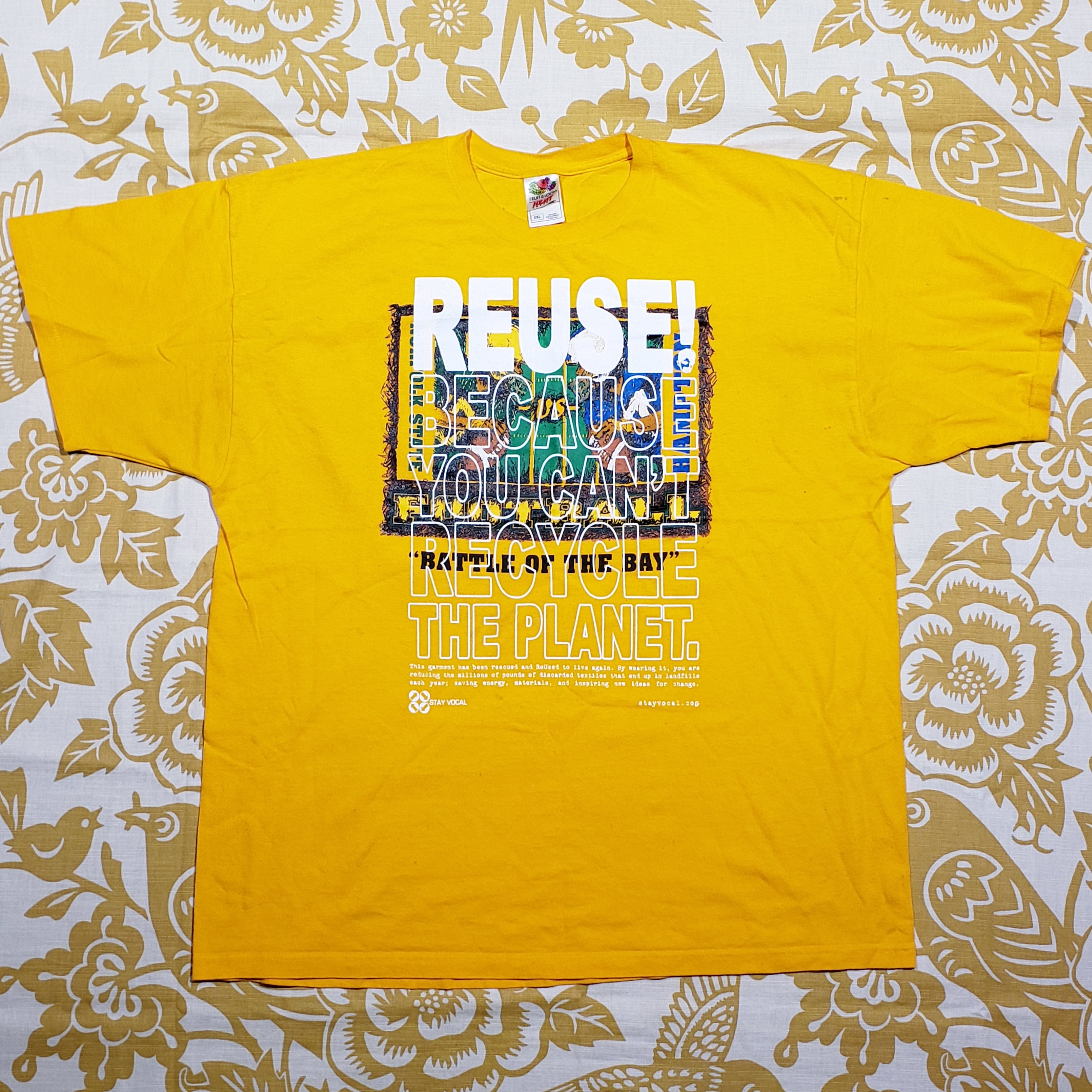 Eco friendly upcycled yellow Battle of the Bay football T-Shirt that says Reuse Because You Can't Recycle The Planet.