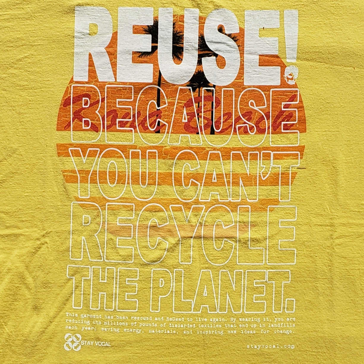 Eco friendly upcycled yellow Kona Beach T-Shirt that says Reuse Because You Can't Recycle The Planet.