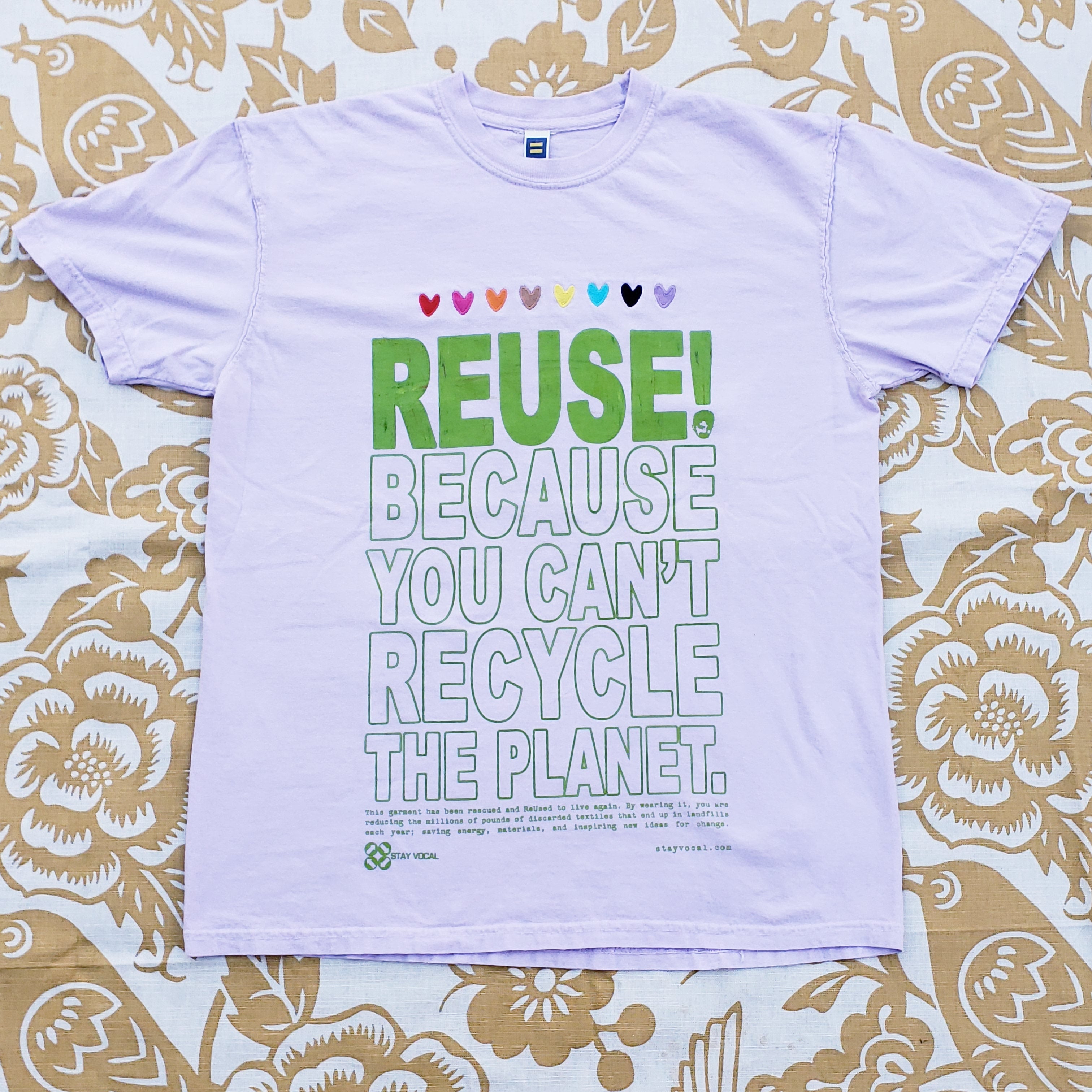 Eco friendly upcycled purple embroidered hearts T-Shirt that says Reuse Because You Can't Recycle The Planet.