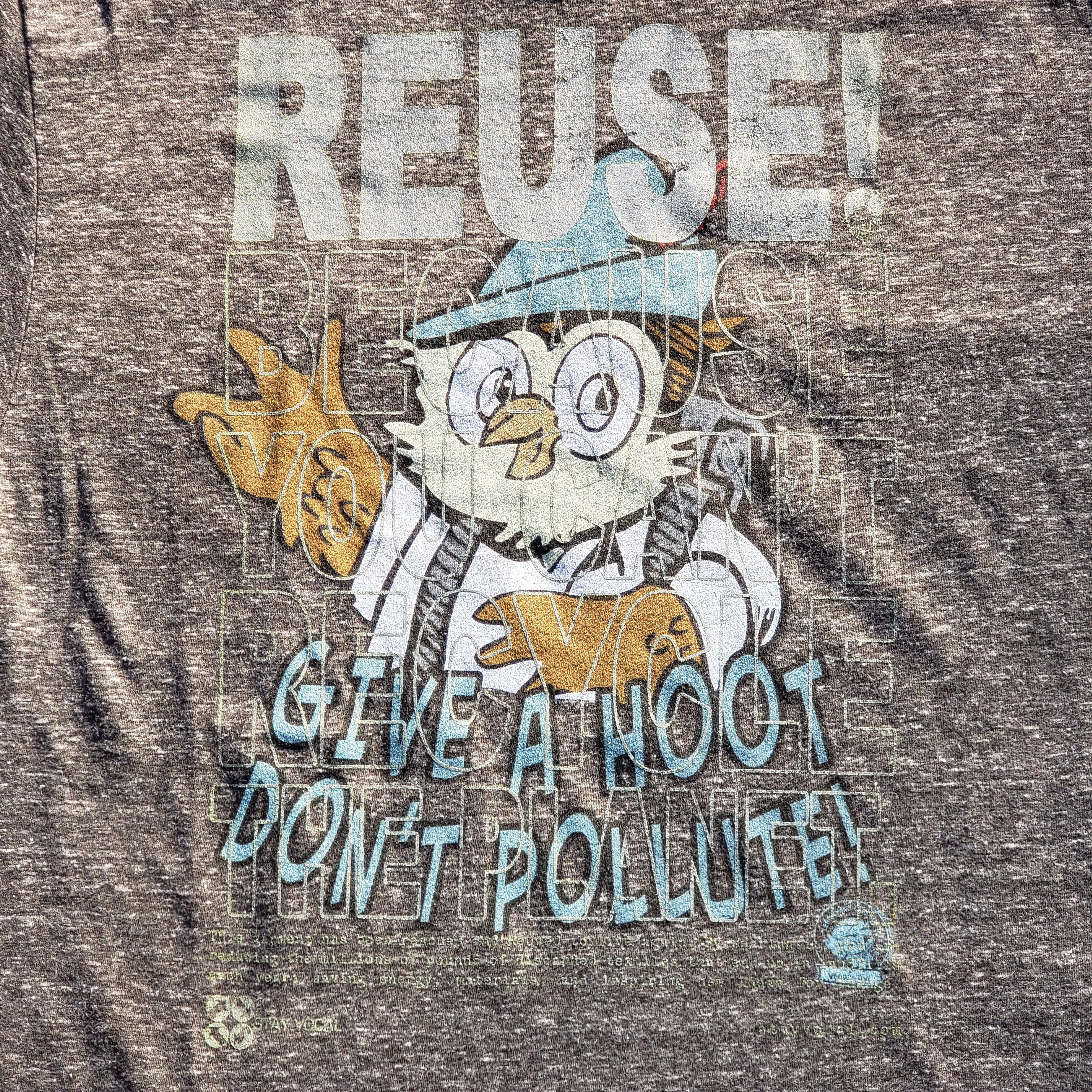 Eco friendly upcycled charcoal gray Woodsy Owl T-Shirt that says Reuse Because You Can't Recycle The Planet.