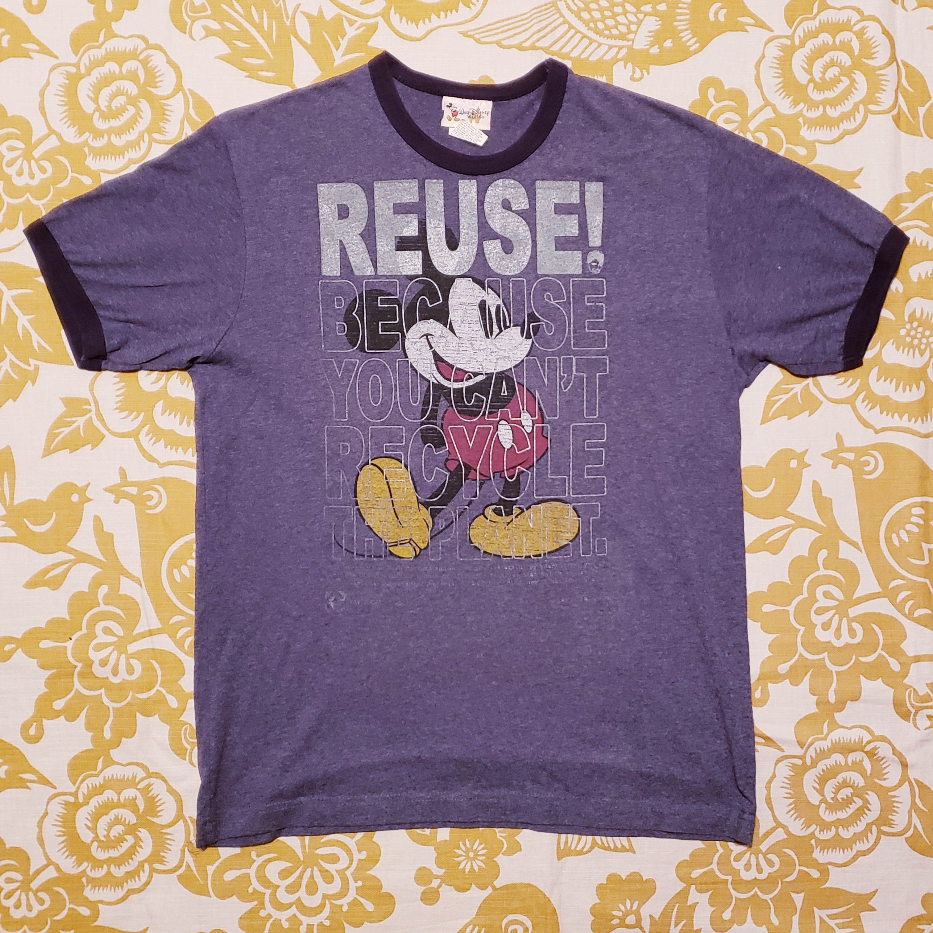 Eco friendly upcycled blue vintage Mickey Mouse T-Shirt that says Reuse Because You Can't Recycle The Planet.