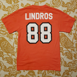 Eco friendly upcycled orange Eric Lindros Flyers T-Shirt that says Reuse Because You Can't Recycle The Planet.