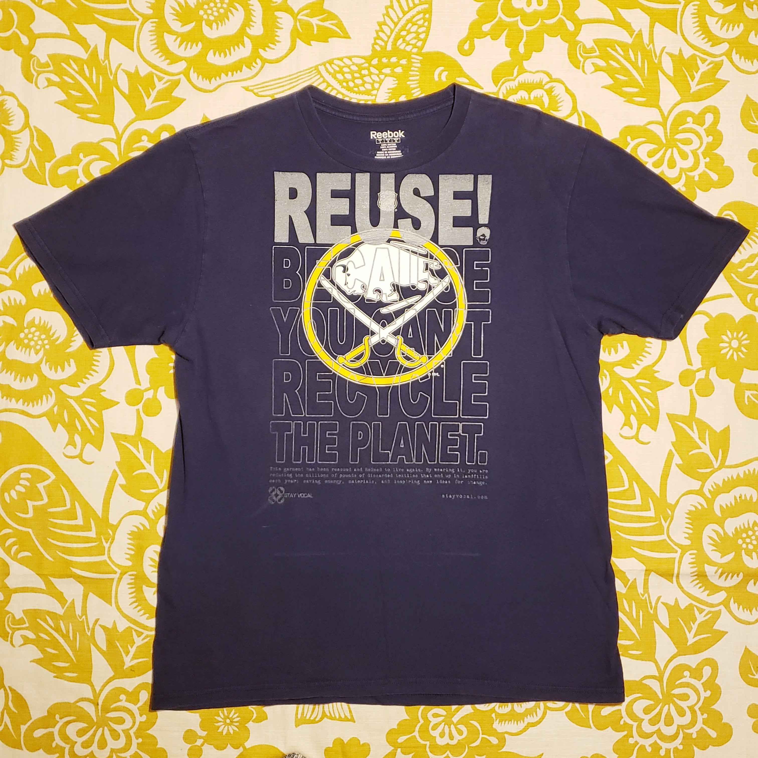 Eco friendly upcycled blue Jack Eichel Sabrs T-Shirt that says Reuse Because You Can't Recycle The Planet.