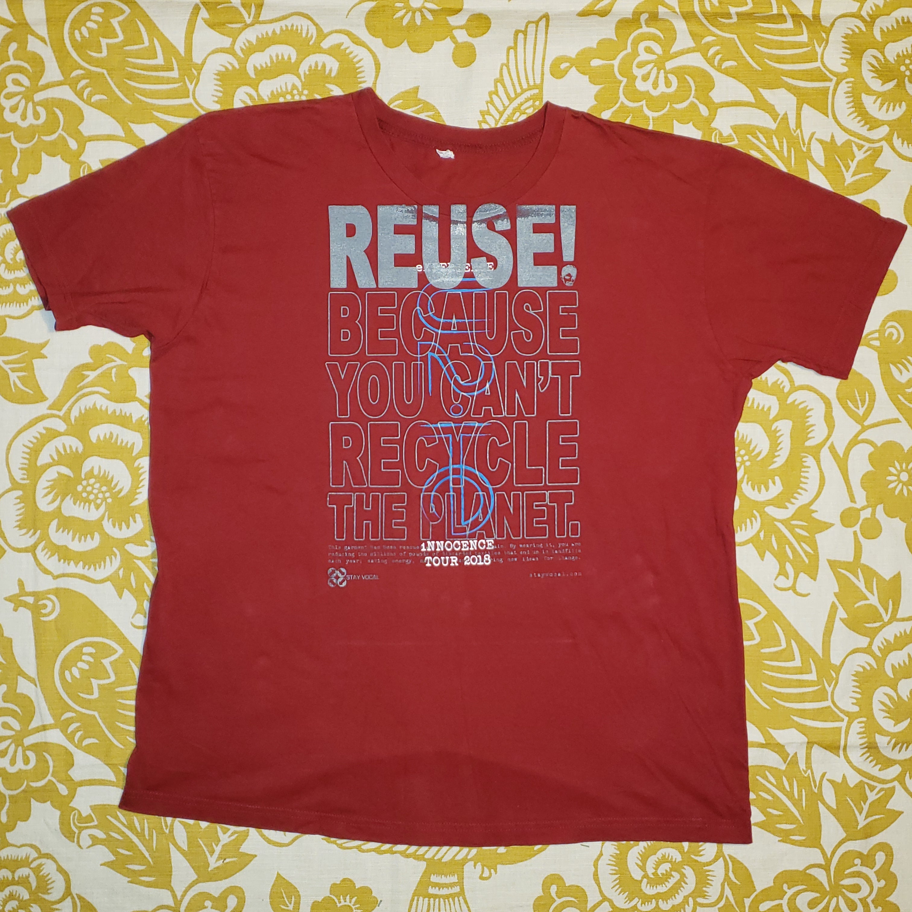 Eco friendly upcycled maroon U2 Innocence Shirt that says Reuse Because You Can't Recycle The Planet.