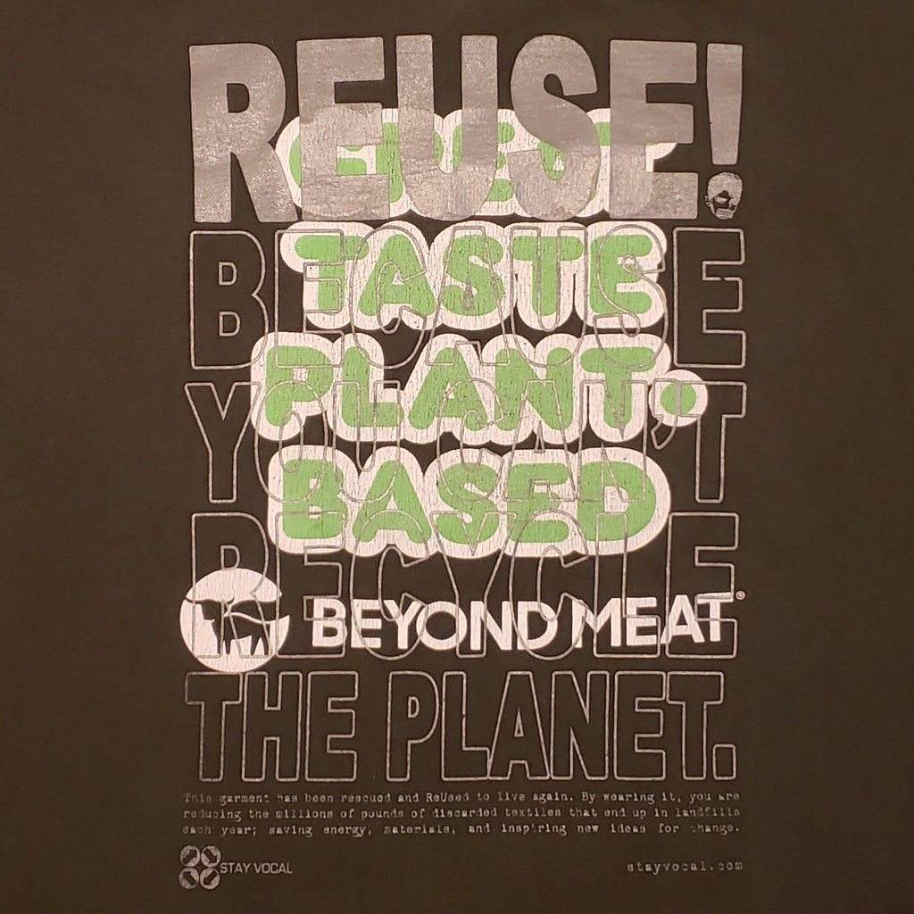 Eco friendly upcycled Green Beyond Meat T-Shirt that says Reuse Because You Can't Recycle The Planet.