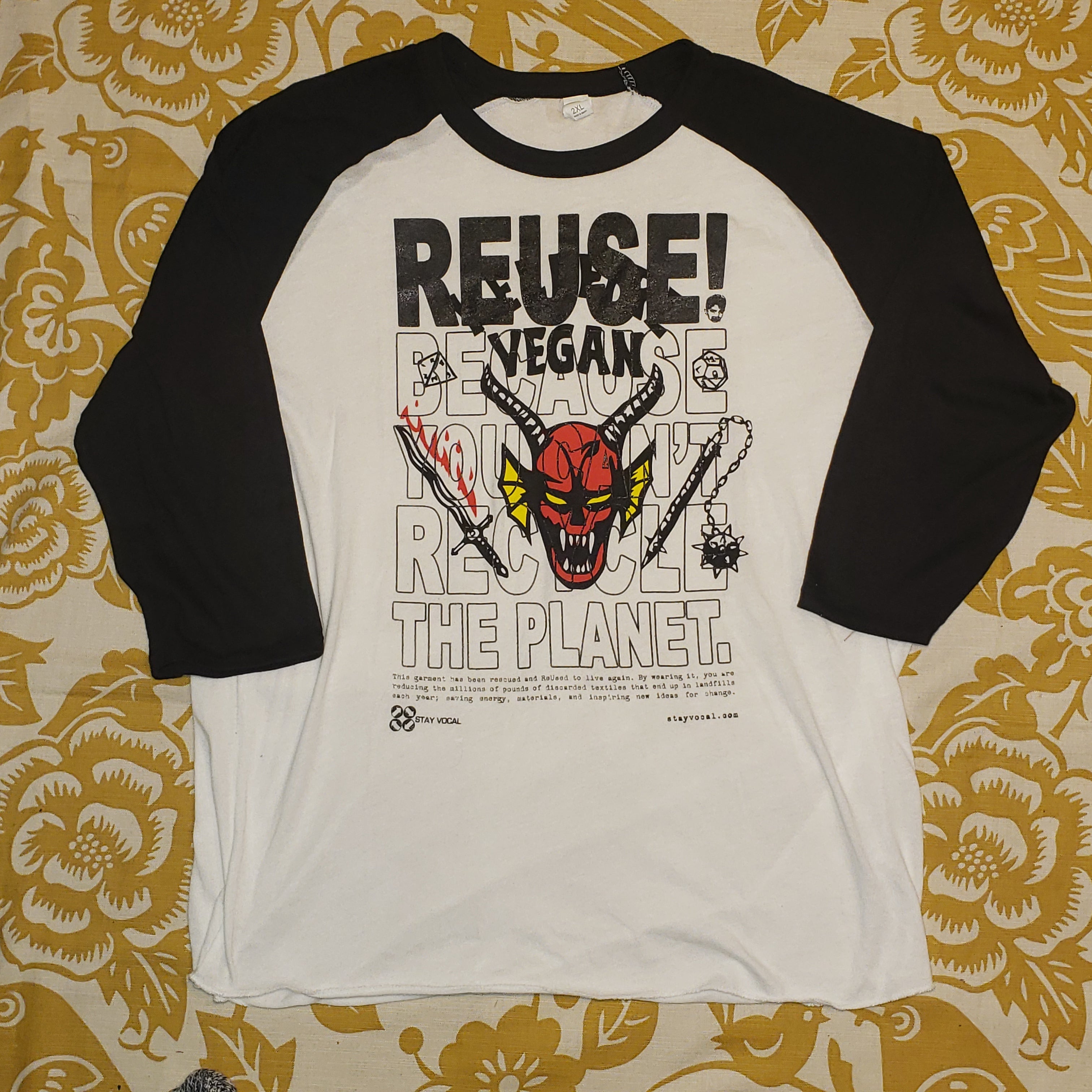 Eco friendly upcycled white Devil T-Shirt that says Reuse Because You Can't Recycle The Planet.