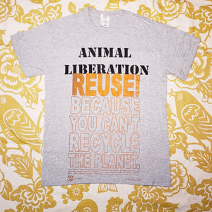 Eco friendly upcycled Animal Liberation T-Shirt that says Reuse Because You Can't Recycle The Planet.