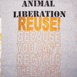 Eco friendly upcycled Animal Liberation T-Shirt that says Reuse Because You Can't Recycle The Planet.