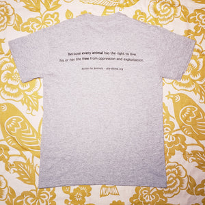 Eco friendly upcycled Animal Liberation T-Shirt that says Reuse Because You Can't Recycle The Planet.