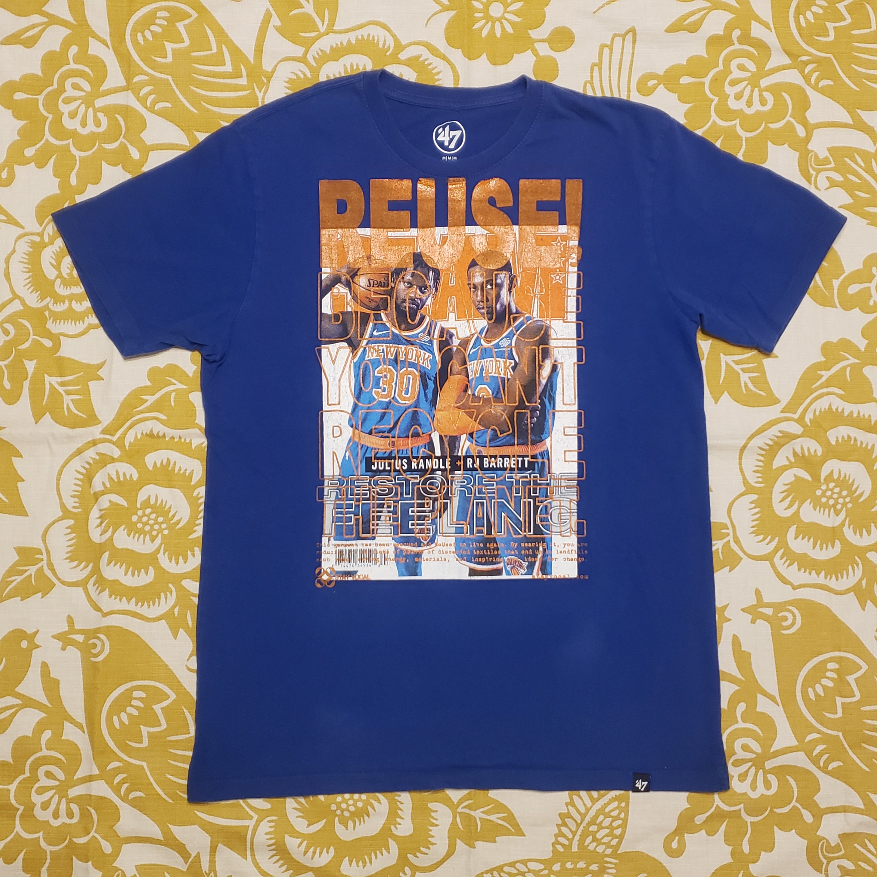 Eco friendly upcycled blue New York Knicks basketball T-Shirt that says Reuse Because You Can't Recycle The Planet.