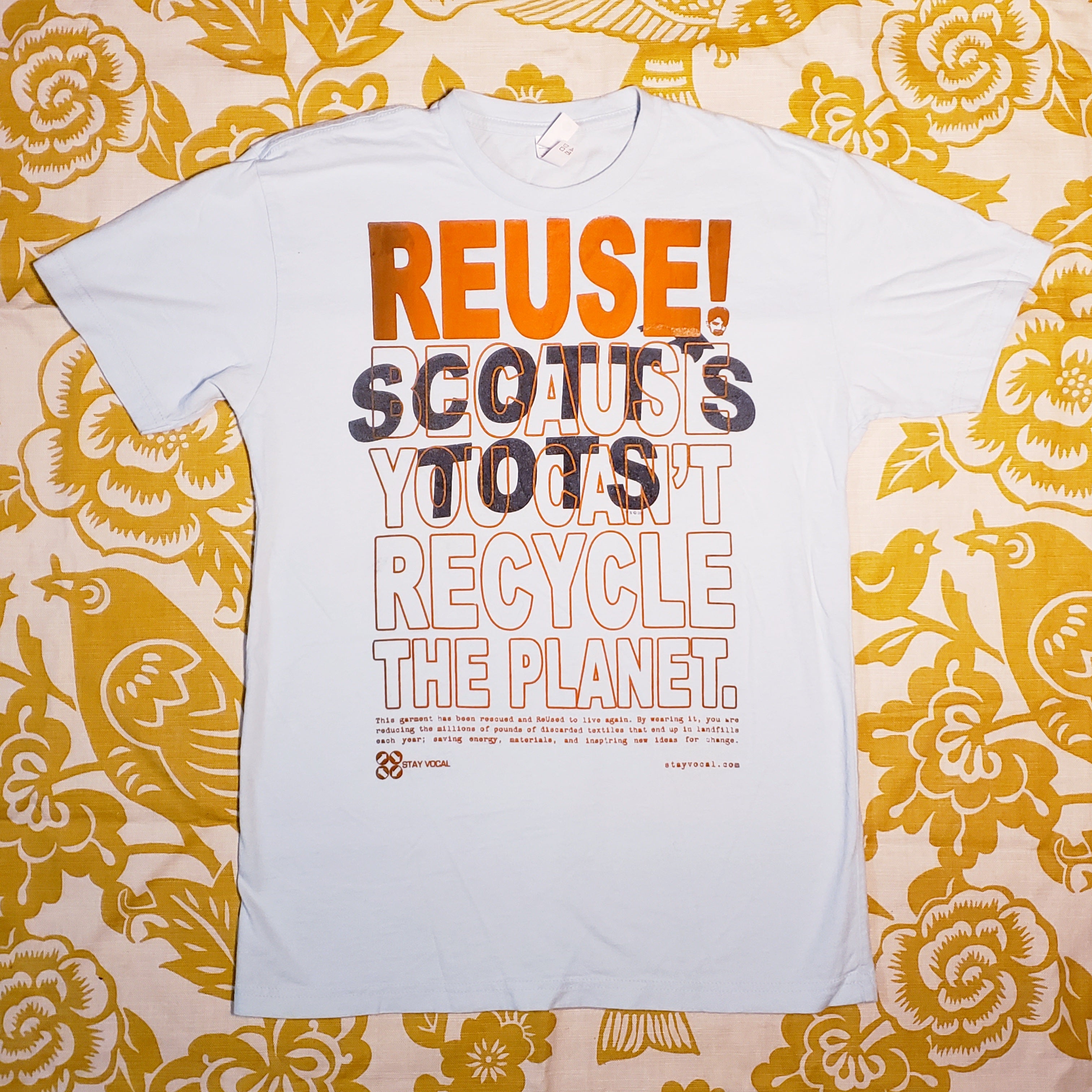 Eco friendly upcycled blue Scott's Tots T-Shirt that says Reuse Because You Can't Recycle The Planet.