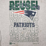 Eco friendly upcycled gray New England Patriots T-Shirt that says Reuse Because You Can't Recycle The Planet.
